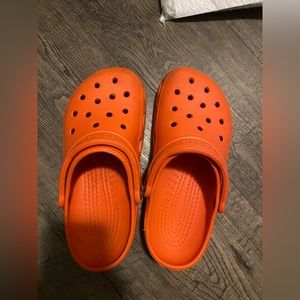 orange crocs. men’s size 5 women’s size 7